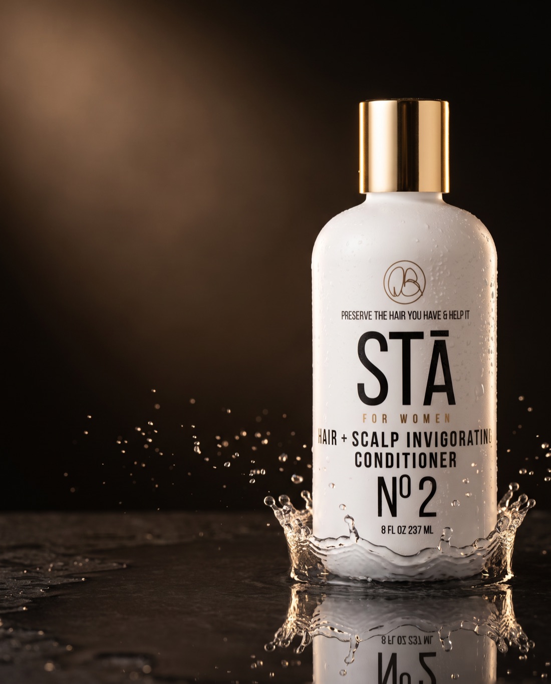 STĀ For Women Hair + Scalp Invigorating Conditioner Nº2, white bottle with gold cap, splash of water